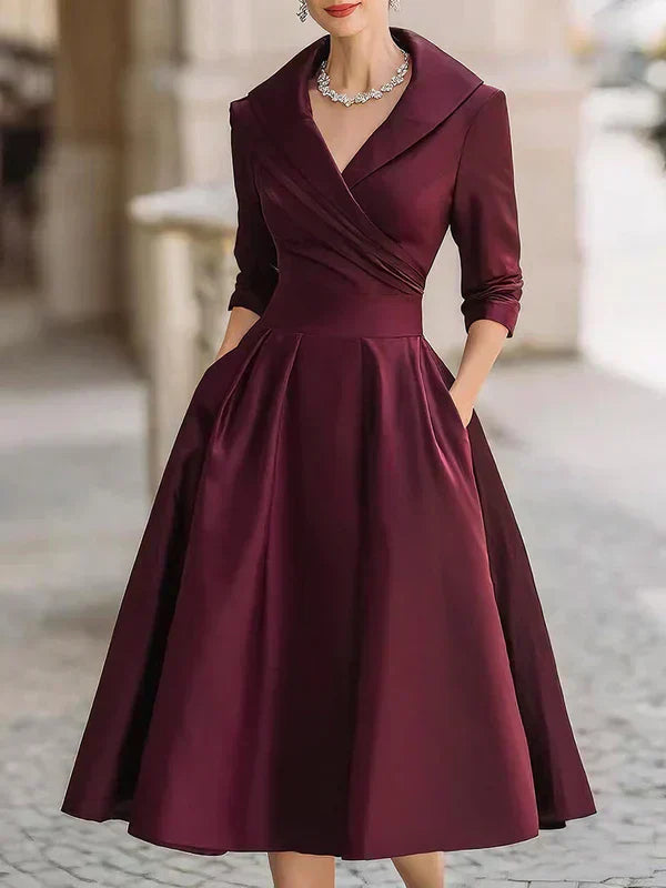 Lenka – Elegantní Midi Šaty s Praktickými Kapsami